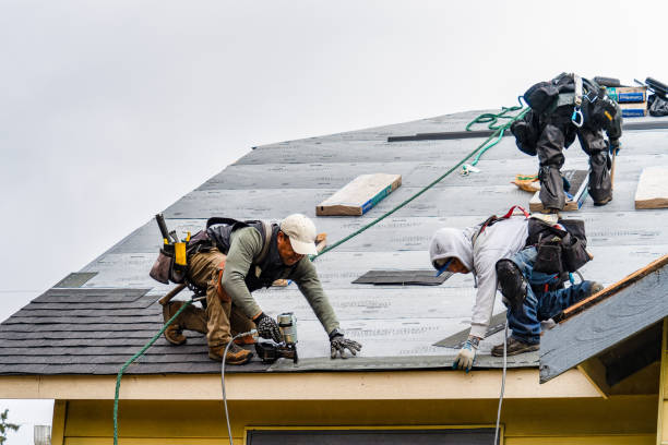 Professional Gutter Installation technician working in Seymour, TX